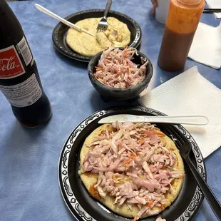 Revuelta pupusa with salsa and curtido. Cheese pupusa.
