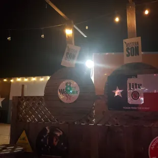 a beer barrel with a sign on it