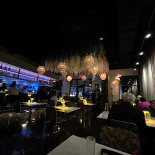 the interior of a restaurant at night