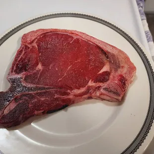 a piece of steak on a plate