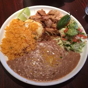 Huge carnitas plate with one egg added