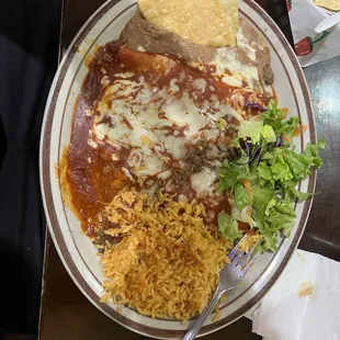 THREE BAKED MEAT ENCHILADAS SERVED WITH RED, GREEN OR SPANISH SAUCE