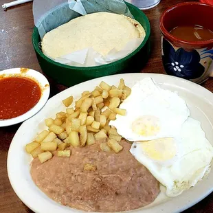 Huevos Rancheros, corn tortillas, and coffee.