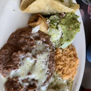 Combo 3 item - beef crunchy taco, chicken taquito, green chicken enchilada, rice and beans