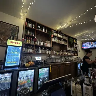 a bar with a lot of bottles of liquor