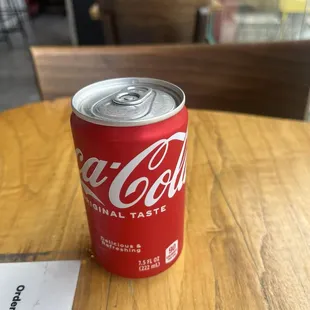 Kid size 7.5oz coke $3 no ice cup