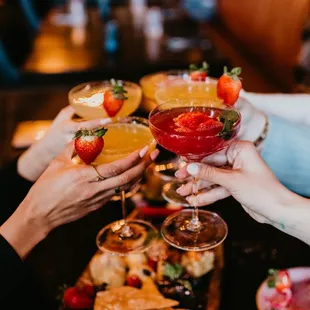 Cheers! Enjoy cocktails with some friends!