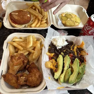 Fried chicken wings and French fries  Carne asada fries con Avocado