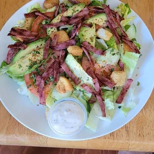 My salad was very yummy  thank you guys I loved  Romain lettuce,cucumber,avocado turkey bacon,crutons, Parsly and Rancho