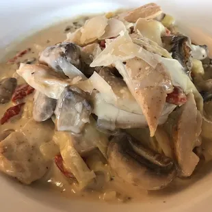 a pasta dish with mushrooms and cheese