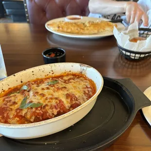 (close) Pasta Sampler and (far) Stromboli