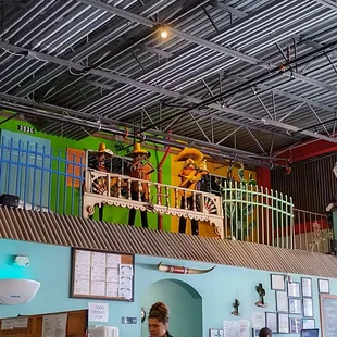 a woman standing in a restaurant