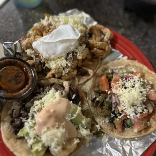 Surf and Turf Taco, Nopalitos Taco, and Mushroom-Pollo Taco