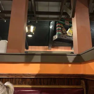 a woman sitting in a booth