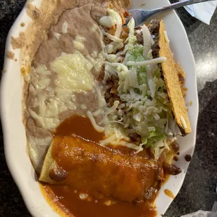 Taco, enchilada, beans and rice.