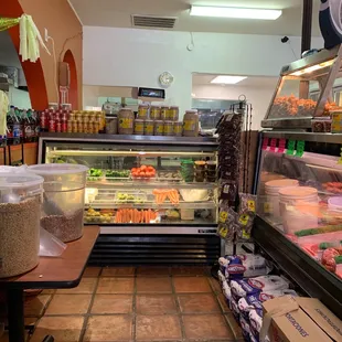 a display of meat and vegetables