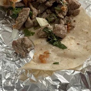 Saddest steak taco in the world, with salsa I added.