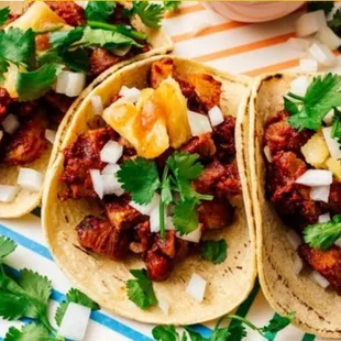 three tacos on a plate