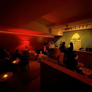 people in a dimly lit room