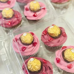 chocolate cupcakes with pink frosting