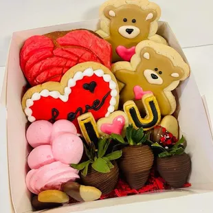 a box of decorated cookies