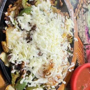 Carnitas and shrimp fajita