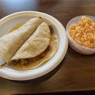 Shredded beef &amp; chorizo &amp; egg tacos on flour
