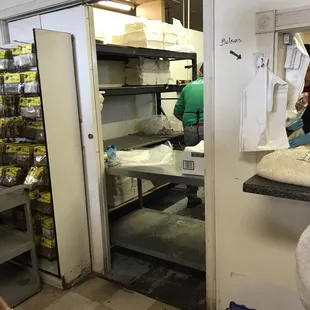 a woman in a kitchen