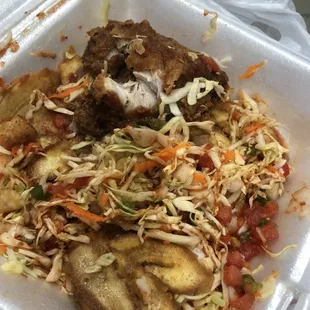 Worst pollo con tajadas. Not even the right ingredients this comes with encurtido, plain cabbage, aderezo and queso seco.