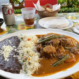 Beef stew, rice and black beans
