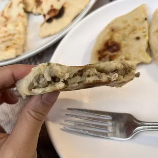 Inside steak pupusa (there is cheese)