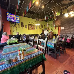 tables and chairs in a mexican restaurant