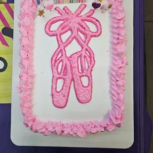There are 24 cupcakes underneath this! The frosting on top was light, fluffy, and delicious!