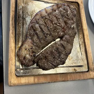 a steak on a cutting board