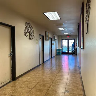 Hallway in back of the stage leads to the front.