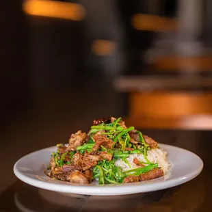 Stir fried watercress and Crispy pork.