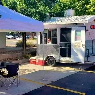 a food truck parked in a parking lot