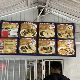 menus on the wall of a restaurant