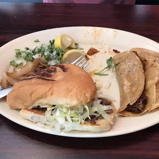I split the meals with my boyfriend, but this is half a fajita torta and two pastor tacos.