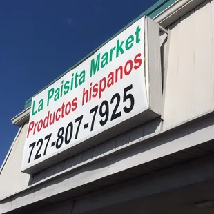 a sign on the side of a building