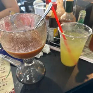 The cup was half full given I actually liked the taste of the concoction of Clamato juice ...