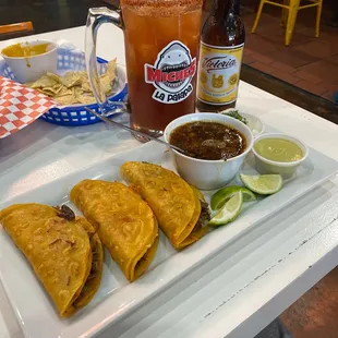 Queso tacos de birria de res