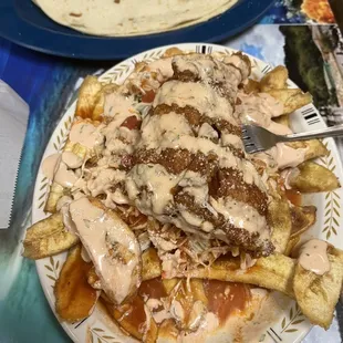 Pollo con tajadas