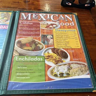 a mexican food menu on a table