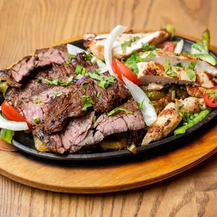 a plate of meat and vegetables