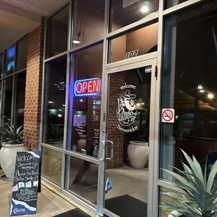 the entrance to a restaurant