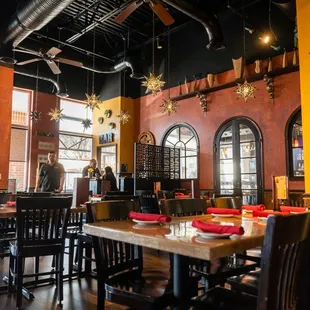 a dining room with stained glass windows