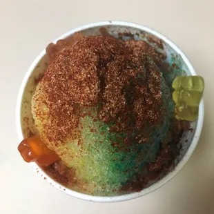 Med. Snowfruit (honeydew,,   , shaved   + shaved ice (1/2  1/2 flavors), chamoy (chile, lime, salt) gummi bear garnish
