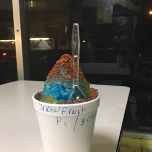 Med. Snowfruit (honeydew,,   , shaved   + shaved ice (1/2  1/2 ), chamoy (chile, lime, salt) gummi bear garnish