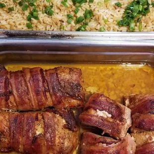 two pans of food with meat wrapped in bacon